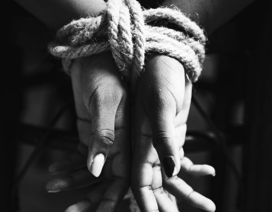 Hands tied with a rope